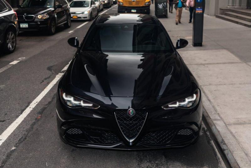the-lightweight-carbon-fiber-hood-is-sculpted-and-like-those-of-so-many-luxury-cars-these-days-the-headlights-are-narrow-somewhat-menacing-slits.thumb.jpg.b7c6ee8ff8f208ce538ad71b42fb5db0.jpg