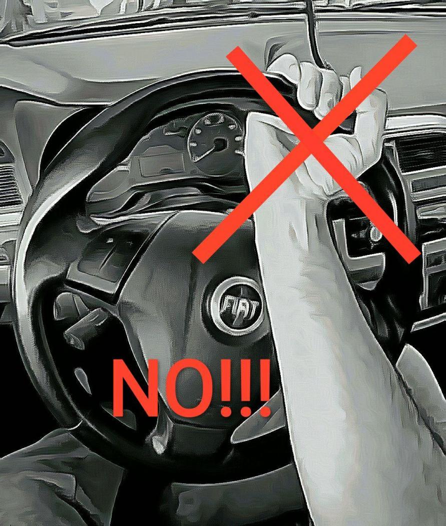 Uso ed impugnatura sbagliata del volante.jpg