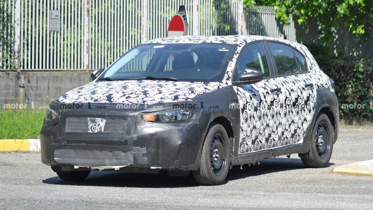 130327580_fiat-tipo-cross-spy-photo(2).thumb.jpg.7623f129ee7ec3cab843adad0fb11692.jpg