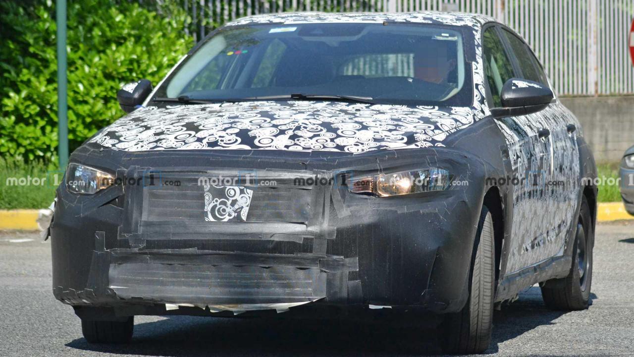 518349807_fiat-tipo-cross-spy-photo(3).thumb.jpg.fa92c4392da48083e0896e10ab3bcab6.jpg