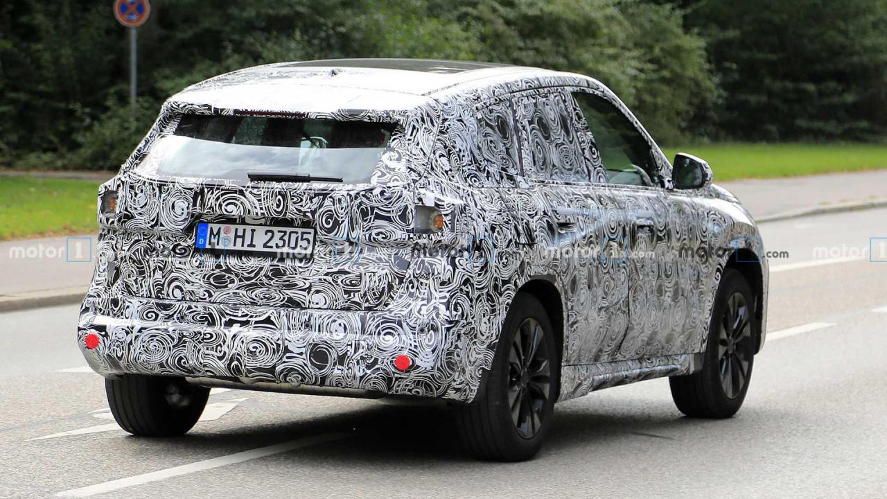 2022-bmw-x1-spy-photo-rear-three-quarters.thumb.jpg.a8eb568cd4670a0fedb30153fa48e561.jpg