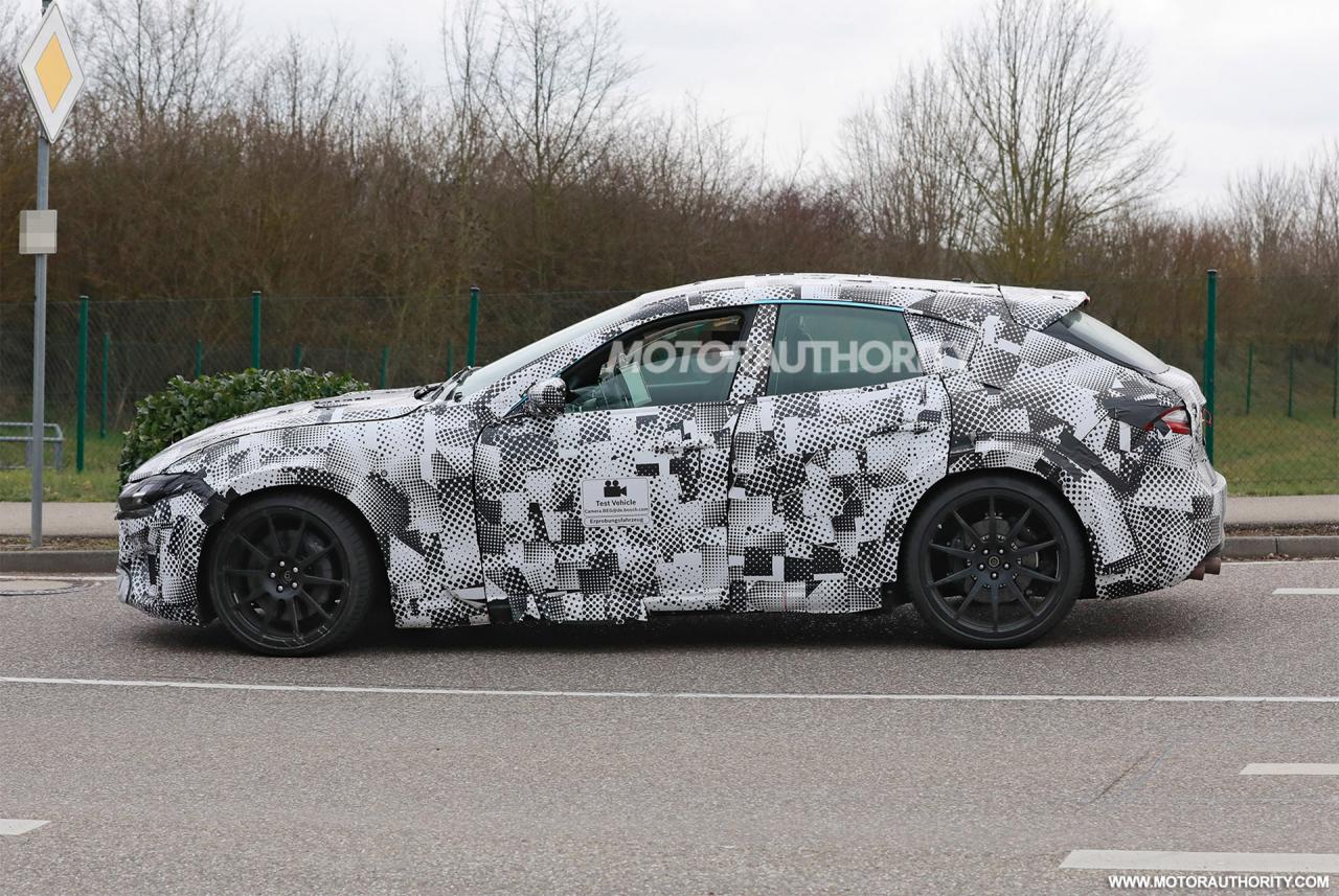 2023-ferrari-purosangue-test-mule-spy-shots--photo-credit-s-baldauf-sb-medien_100787049_h.thumb.jpg.3d85400837a247378989e74db411e84c.jpg