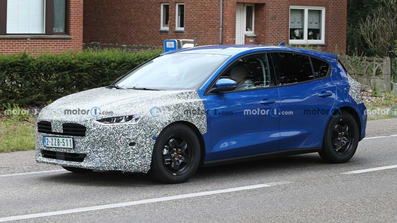 1709573554_2022-ford-focus-spy-photo(6).thumb.jpg.02c475b980e78a9004cdf7b59d7da201.jpg