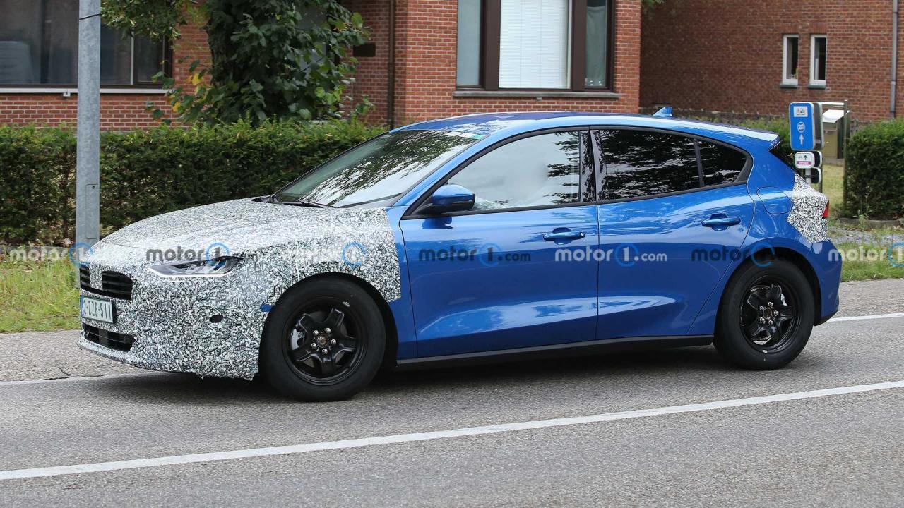 1721931353_2022-ford-focus-spy-photo(5).thumb.jpg.58dbbaafcb296c8df6ecfde7cbf47fed.jpg