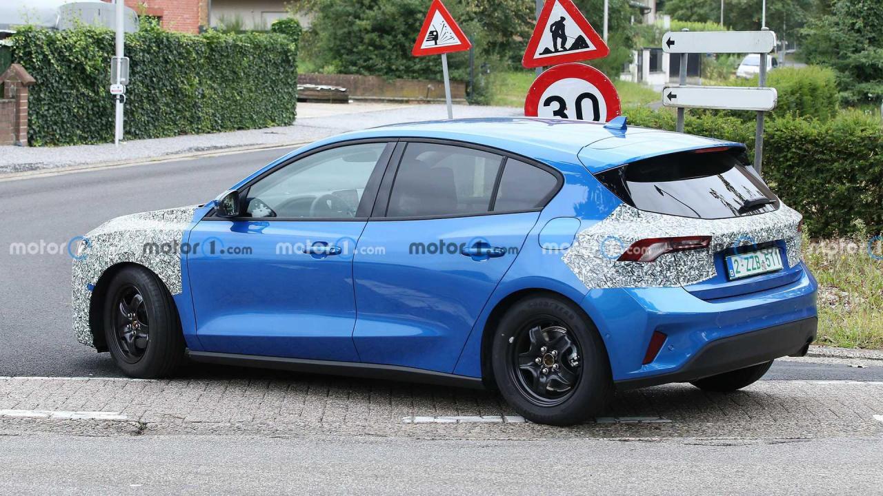 1809213535_2022-ford-focus-spy-photo(3).thumb.jpg.12b4f5d5954a0b971ef73a1ea3a0624a.jpg