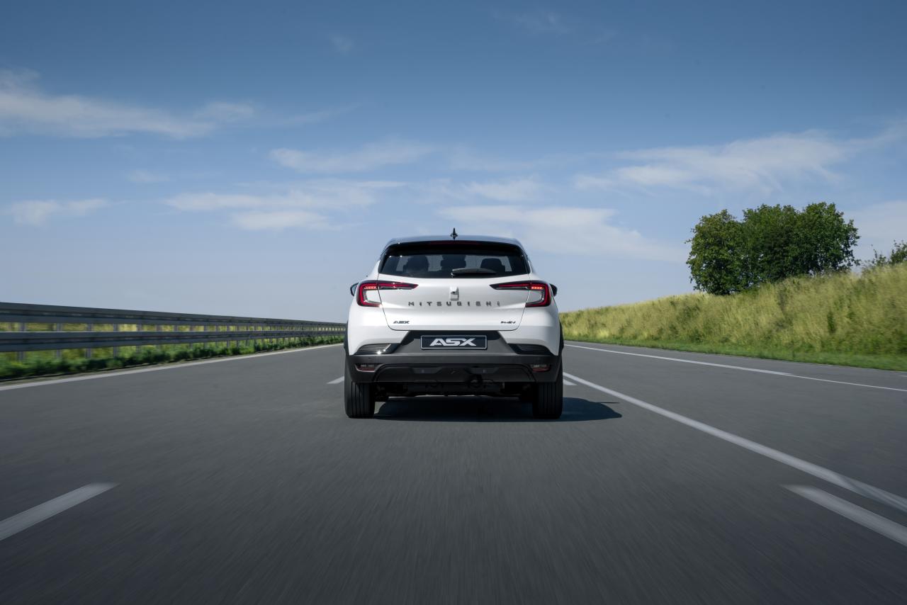 23my_asx_phev_instyle_pr_image_driving_rear.jpg