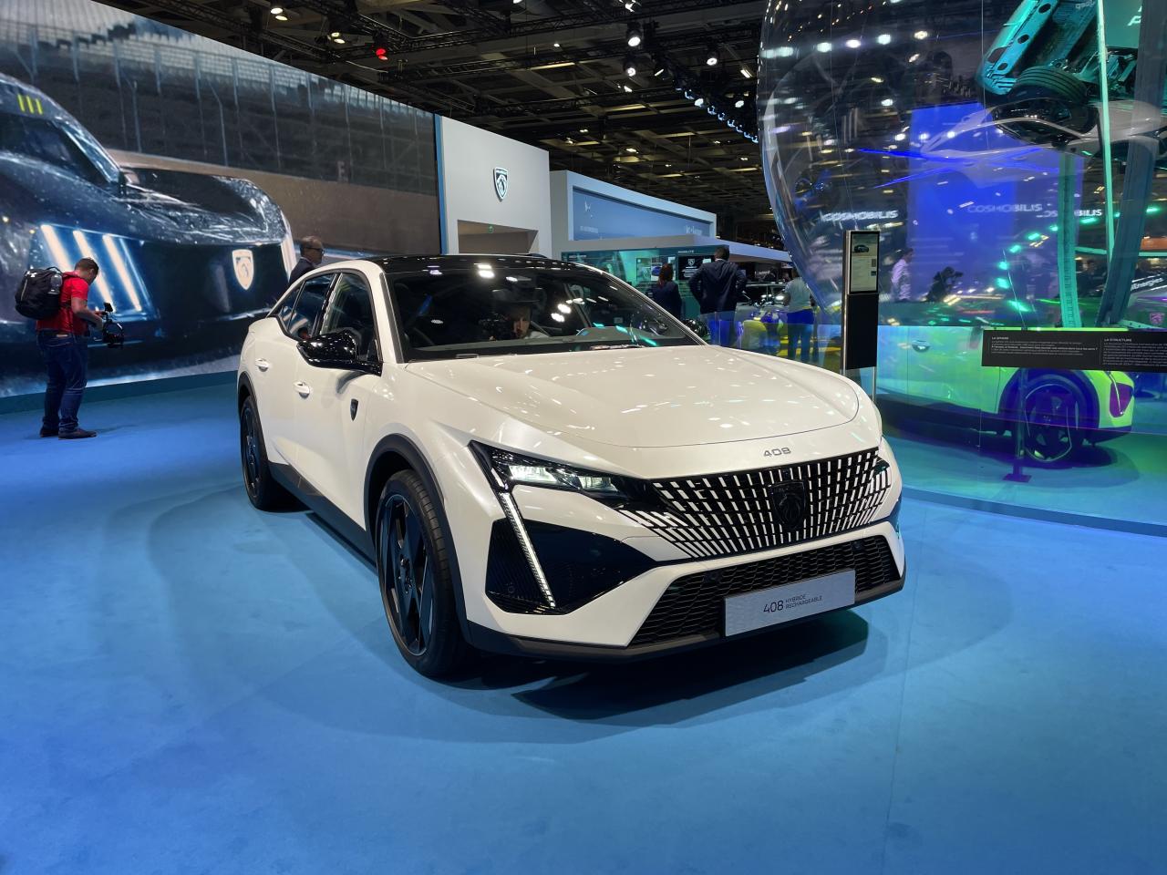S0-mondial-de-l-auto-2022-peugeot-408-la-star-du-salon-730493.thumb.jpg.0214f31d2037767e9535fe6d931e5756.jpg
