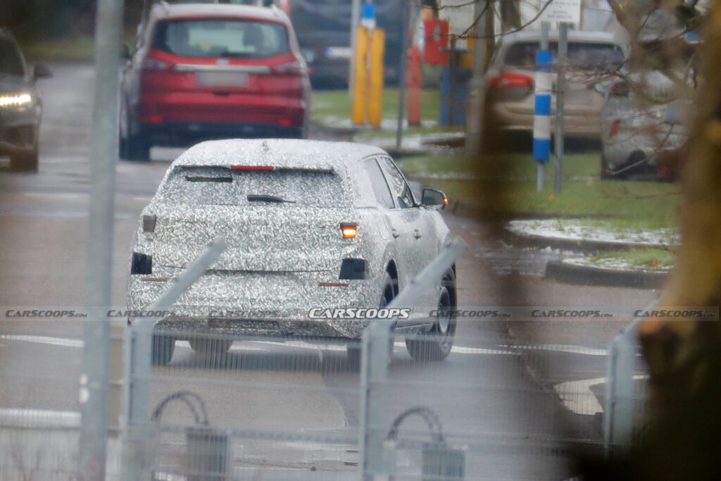 https___www.carscoops.com_wp-content_uploads_2023_01_Ford-EV-SUV-Scoop-7-1024x683.jpg.cf9345f0ce326aa39ca93fc9a9170da3.jpg