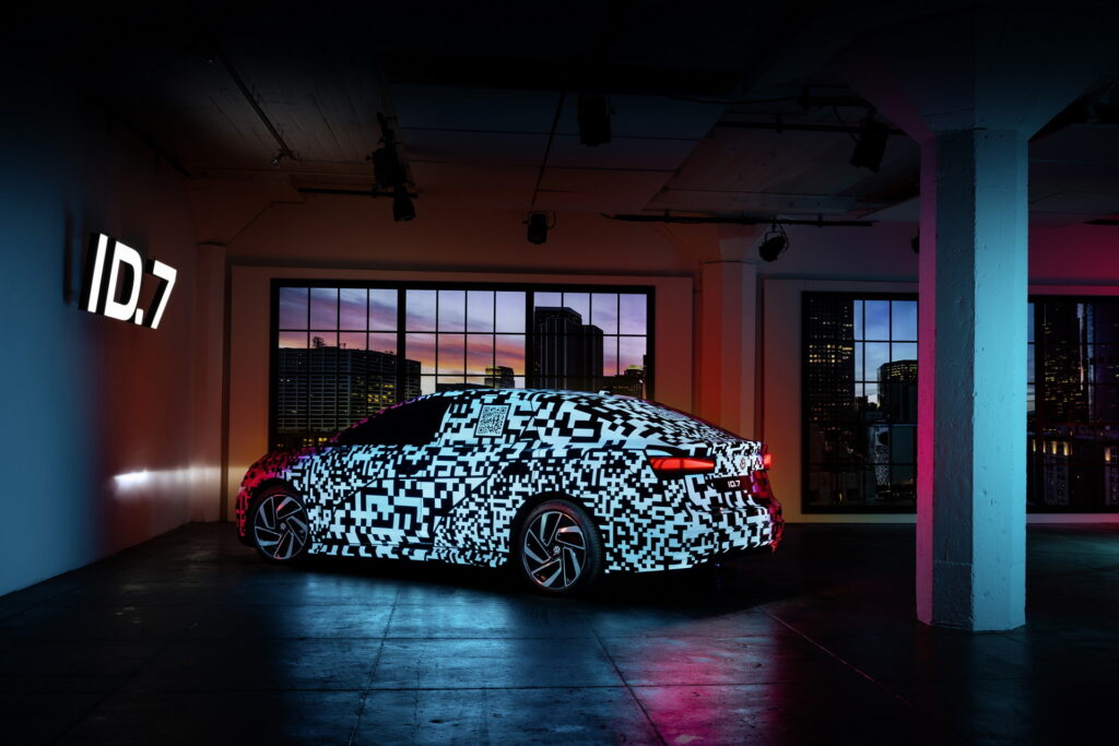 https___www.carscoops.com_wp-content_uploads_2023_01_VW-ID7-CES-Teaser-6-1024x683.jpg.927f4aa59d336afb8e0bc99875b39751.jpg