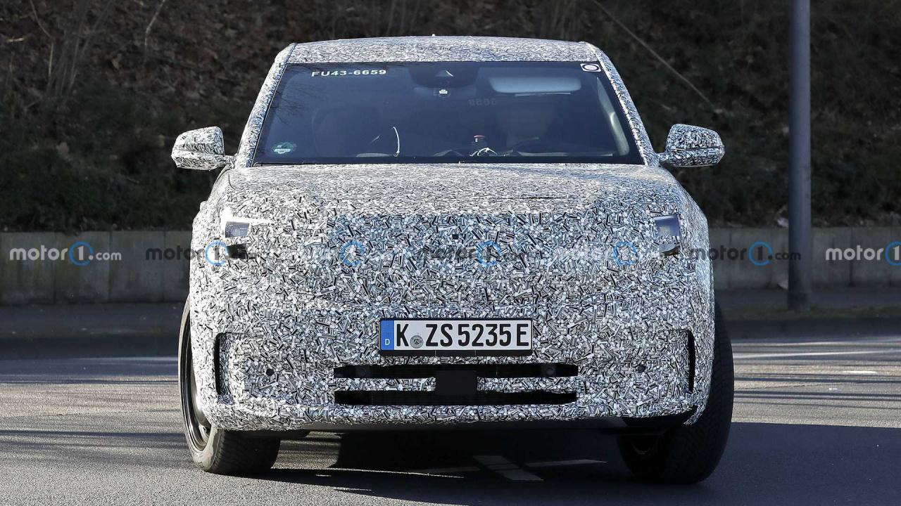 ford-electric-crossover-spy-photos.thumb.jpg.105dd7baabd245d49c171d46cd400051.jpg