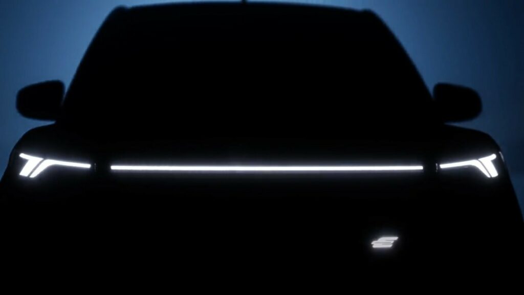 https___www.carscoops.com_wp-content_uploads_2023_04_Ford-E-Transit-Courier-Teaser-2-1024x576.jpg.72e8ac452e0d4f8a7e03f45668197e93.jpg