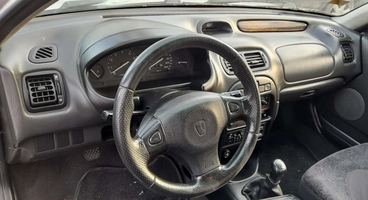 Rover_200_1994_interno.thumb.jpg.4182659282bcdb2a65dbeb653542e9d6.jpg