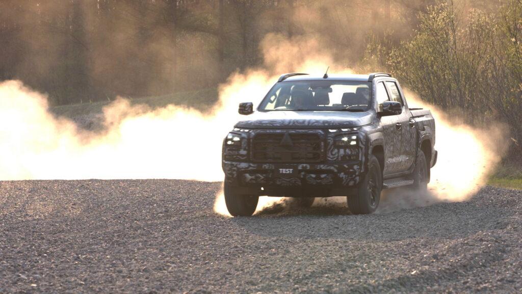 https___www.carscoops.com_wp-content_uploads_2023_07_Mitsubishi-Triton-Engineering-Teaser-1-1024x576.jpg.3673725c521114fa326d55d3effb18c0.jpg