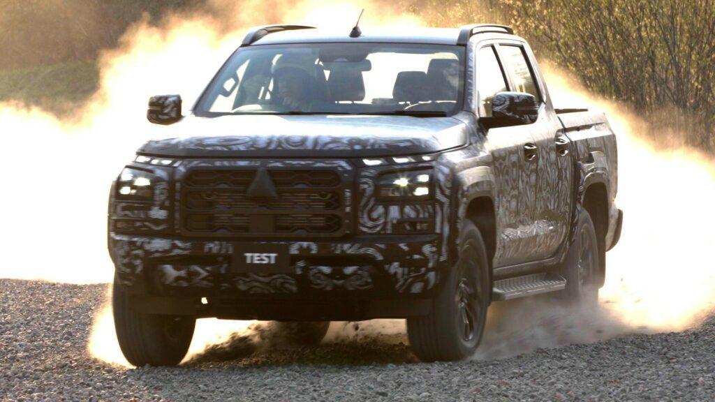 https___www.carscoops.com_wp-content_uploads_2023_07_Mitsubishi-Triton-Engineering-Teaser-1s-1024x576.jpg.b9969916a66d7e5488aea26eba54c2c8.jpg