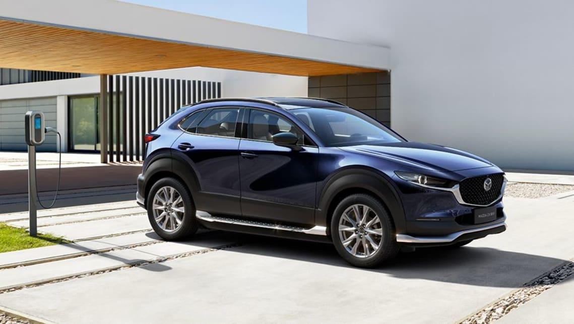 2023-Mazda-CX-30-EV-SUV-Navy-1001x565-(1).jpg.4f7977871ab7b523a45f2aac0f5ddbb0.jpg