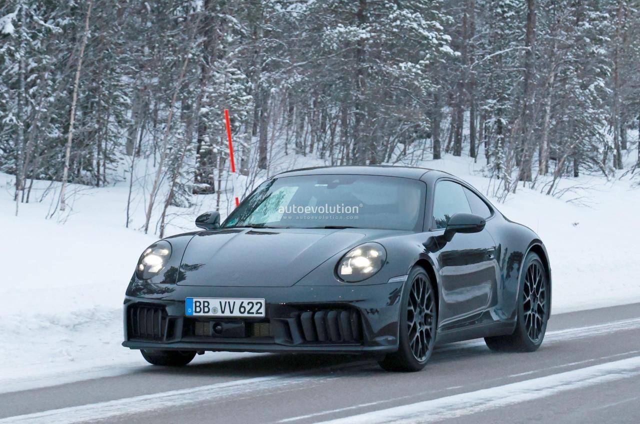 2025-porsche-911-convertible-turbo-spied-with-minimal-camouflage-hybrid-models-incoming_29.thumb.jpg.49dd272ac69fa77fbde4db7ca6234e89.jpg