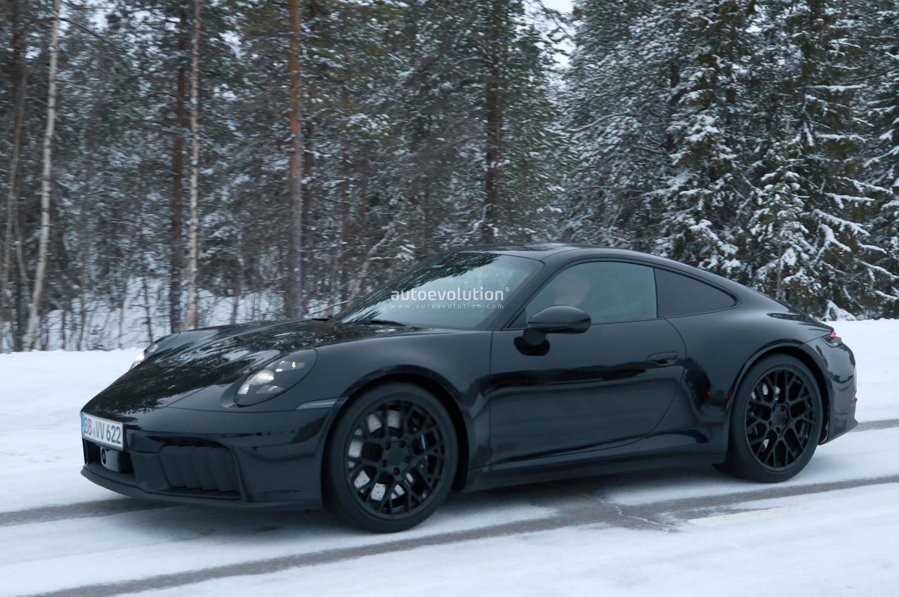 2025-porsche-911-convertible-turbo-spied-with-minimal-camouflage-hybrid-models-incoming_31.thumb.jpg.e400d925aad7b27eab23e11120942420.jpg