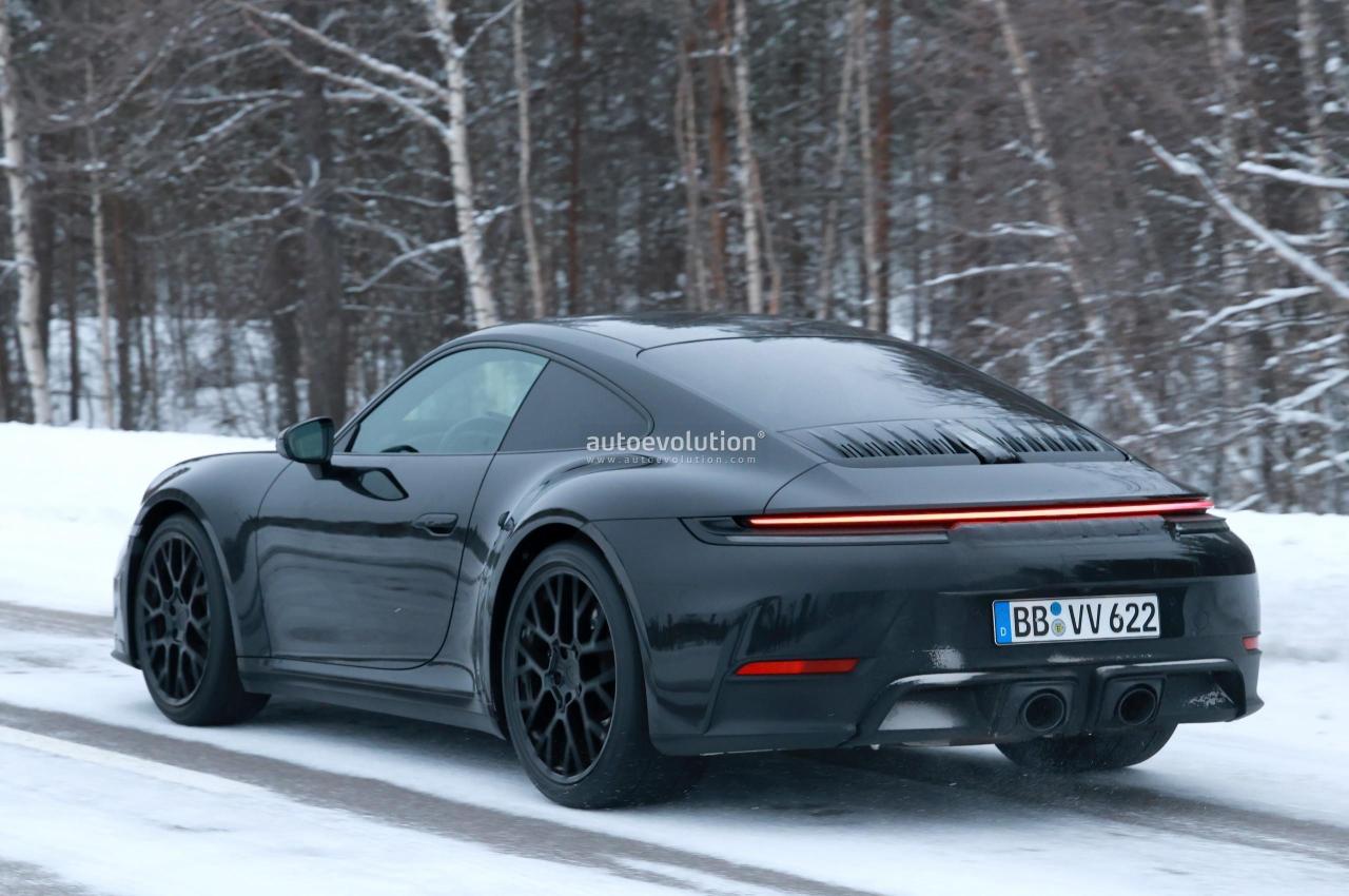 2025-porsche-911-convertible-turbo-spied-with-minimal-camouflage-hybrid-models-incoming_34.thumb.jpg.ad11cdee593c4e576a9dedf860a94c87.jpg