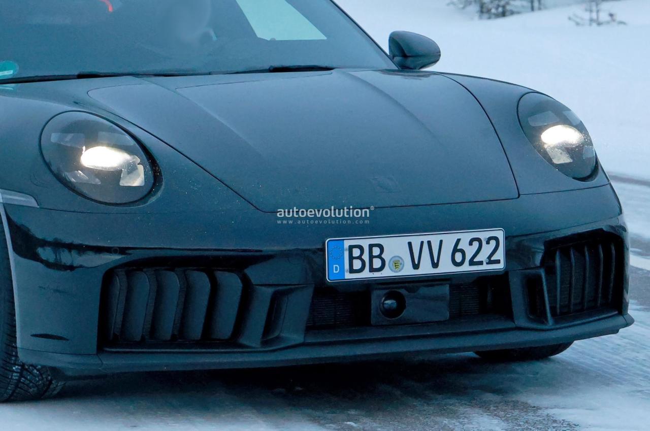2025-porsche-911-convertible-turbo-spied-with-minimal-camouflage-hybrid-models-incoming_37.thumb.jpg.93e6680f33999ff2315d5c2c3f02ae64.jpg