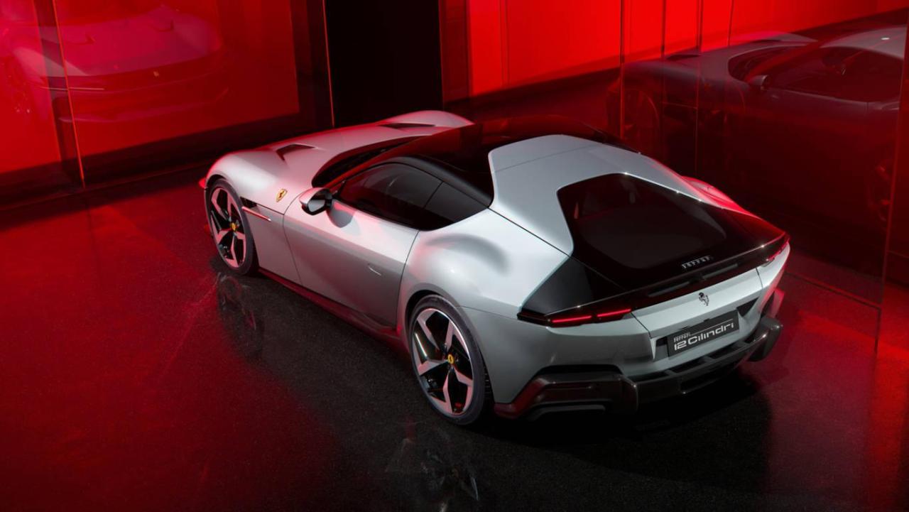 New_Ferrari_V12_ext_04_Design_white_media_d1035602-a9ea-41cc-9308-6f00370a59db.thumb.jpg.bf10375b62657409436e0d0de741e761.jpg