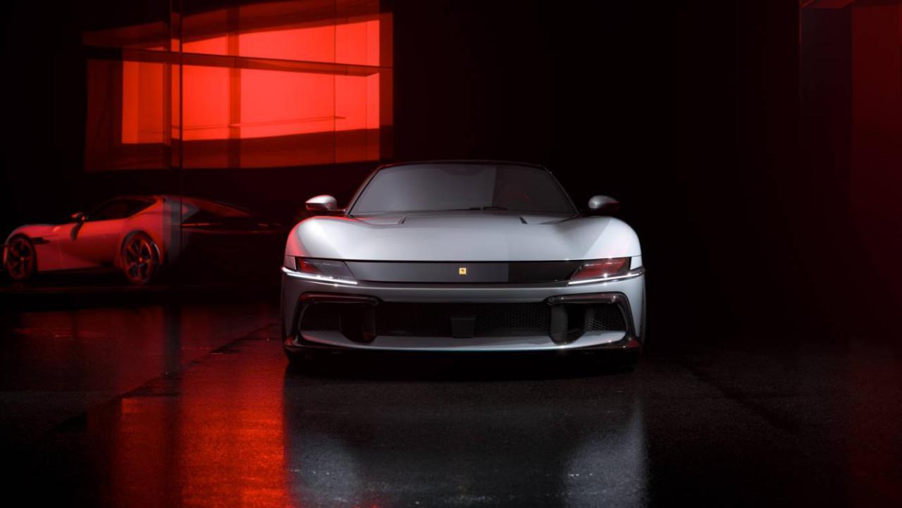 New_Ferrari_V12_ext_08_Design_white_media_09c8862a-f215-49c0-891e-8c3b2d0aeee1.thumb.jpg.b3c162f7e45e4f73b658539a65f4ef57.jpg