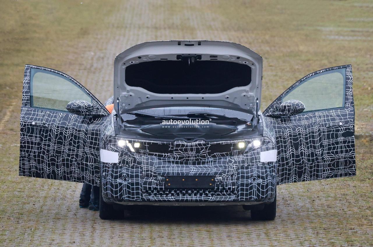 2026-bmw-ix3-neue-klasse-sheds-more-camo-shows-off-reasonably-sized-kidney-thing_1.thumb.jpg.22cc95557e972c9512f48a1b0e01149c.jpg