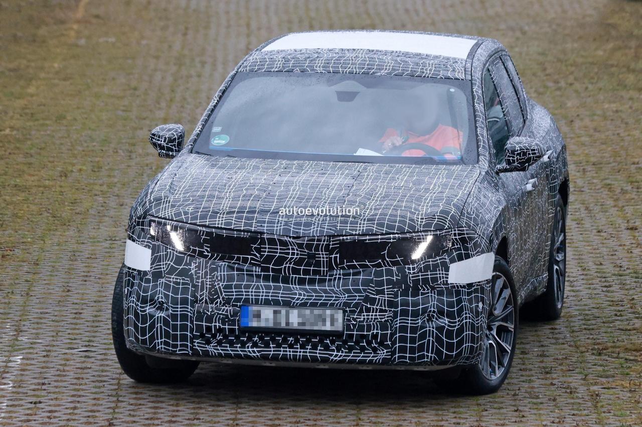 2026-bmw-ix3-neue-klasse-sheds-more-camo-shows-off-reasonably-sized-kidney-thing_13.thumb.jpg.07f625485f684f443b63400a16fbec68.jpg
