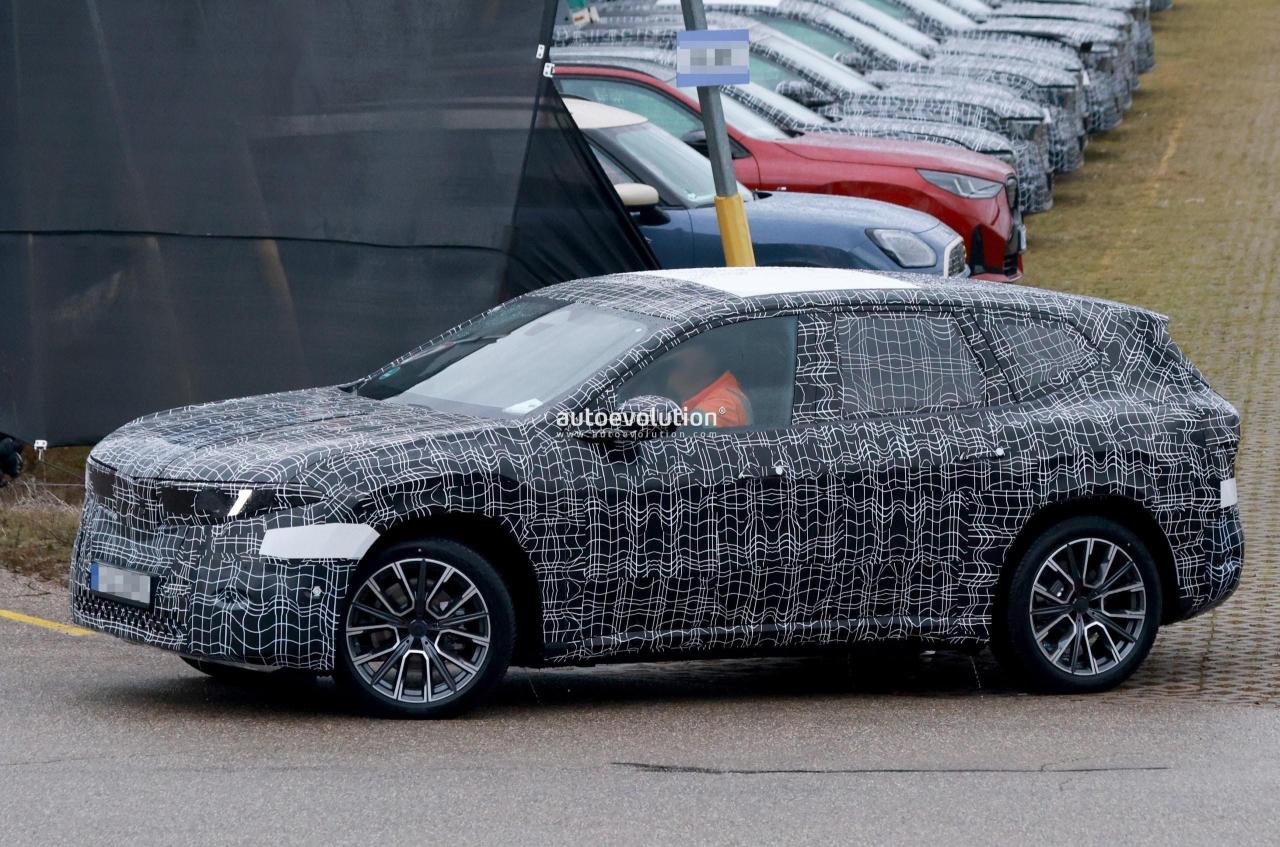 2026-bmw-ix3-neue-klasse-sheds-more-camo-shows-off-reasonably-sized-kidney-thing_15.thumb.jpg.393558c3186bd92cb92432720762f105.jpg