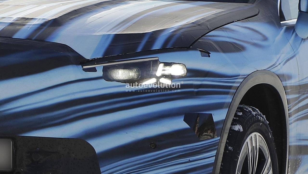 2026-mercedes-benz-glc-ev-spotted-with-production-lights-under-striking-new-camouflage_1.thumb.jpg.a01c5bda197566e123798057ac69ce90.jpg