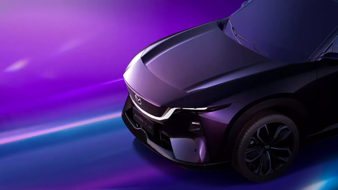 Mazda-CX-6e-004.thumb.webp.6a18f7f4aecba9d0cdb399be6abfa80d.webp