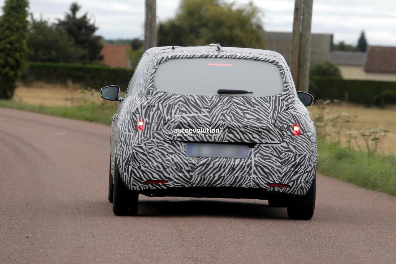2026-renault-twingo-e-tech-spied-again-shows-first-gen-styling-influences_12.thumb.jpg.641555fc2fca8d85adcfe66ac74e50ba.jpg